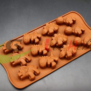 MOLDE SILICONA PARA CHOCOLATE - FORMA DE DINOSAURIO. - Imagen 1